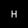 ui-icon-letter_cap_white-cir_black-h.webp